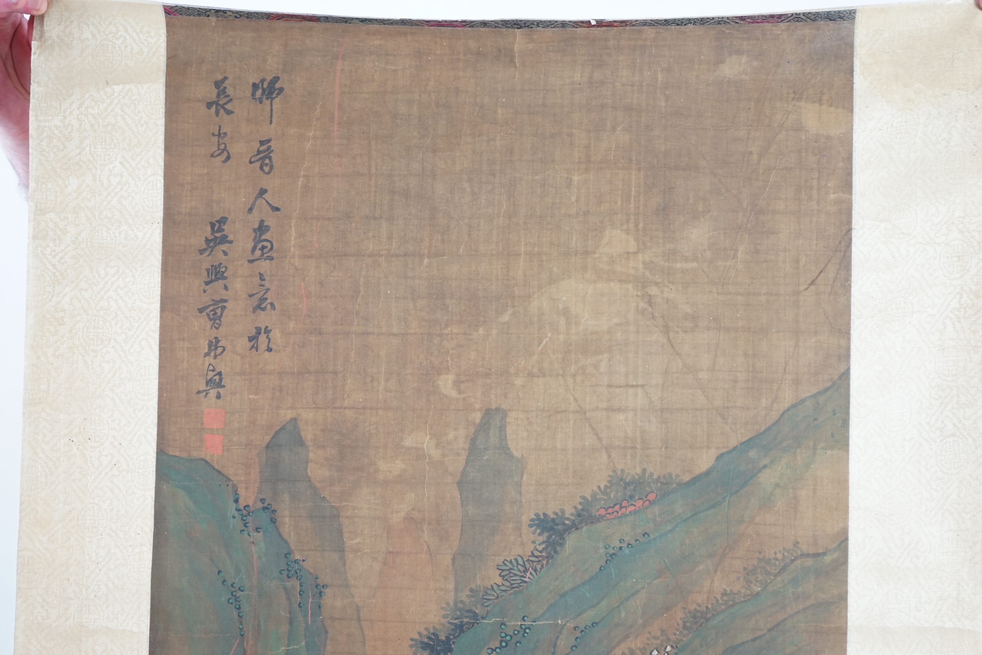 Chinese School, 19th century, scroll painting, ink and colour on silk, scholars in a garden examining a painting